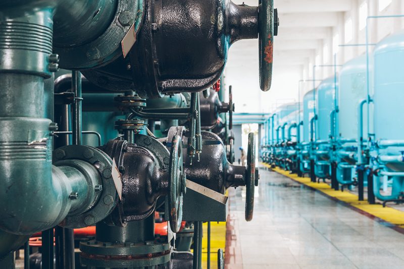 steel pipelines and cables in a plant,Industrial zone.